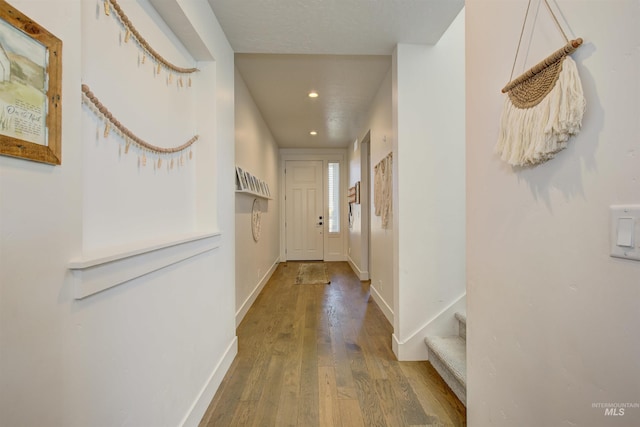 hall featuring hardwood / wood-style flooring