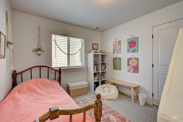 bedroom featuring carpet