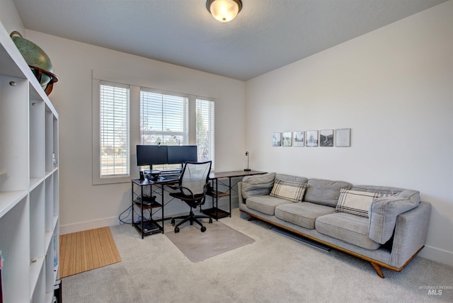 view of carpeted home office