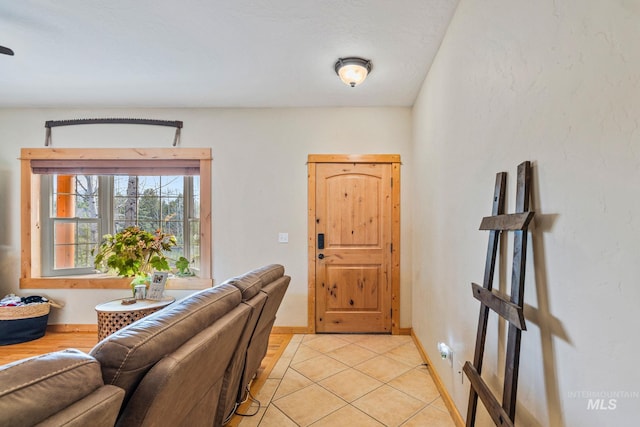 entrance foyer with light tile patterned flooring