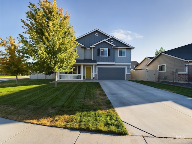 5122 Allentown St, Caldwell, ID 83605 - view of front of property featuring board and batten siding, an attached garage, stone siding, and concrete driveway