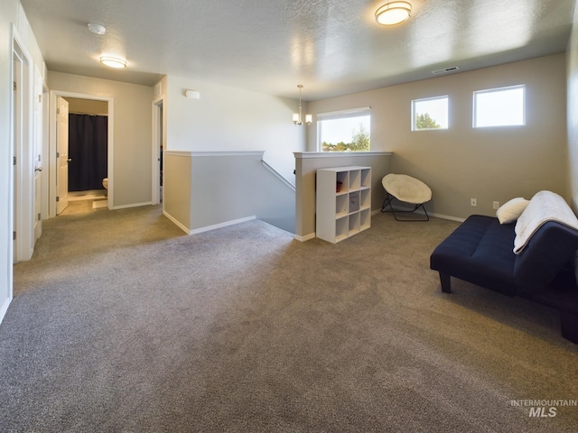5122 Allentown St, Caldwell, ID 83605 - sitting room featuring an upstairs landing, baseboards, and carpet floors