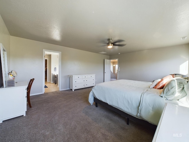 5122 Allentown St, Caldwell, ID 83605 - carpeted bedroom featuring baseboards, a ceiling fan, and ensuite bathroom