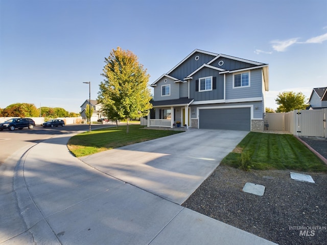 5122 Allentown St, Caldwell, ID 83605 - craftsman house featuring board and batten siding, a garage, concrete driveway, and a porch