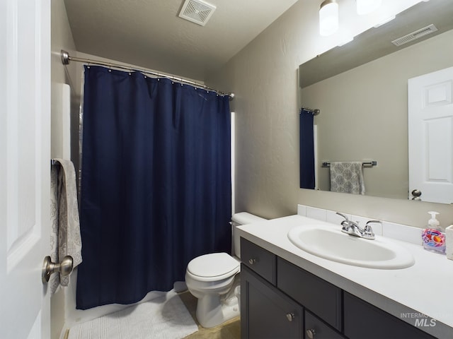 5122 Allentown St, Caldwell, ID 83605 - bathroom featuring toilet, vanity, and a shower with curtain