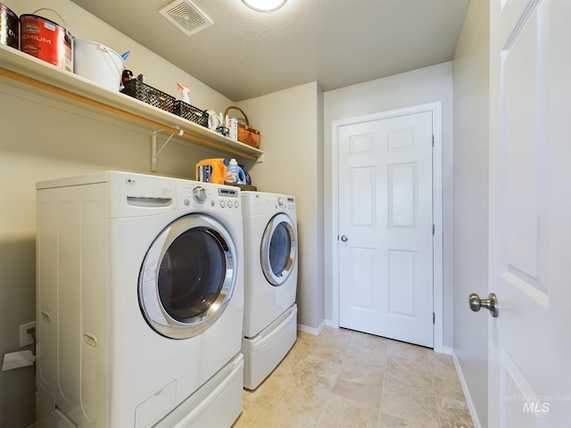 5122 Allentown St, Caldwell, ID 83605 - laundry area featuring washer and clothes dryer and baseboards
