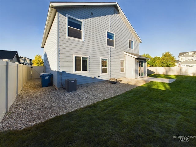 5122 Allentown St, Caldwell, ID 83605 - back of house featuring central air condition unit and a patio