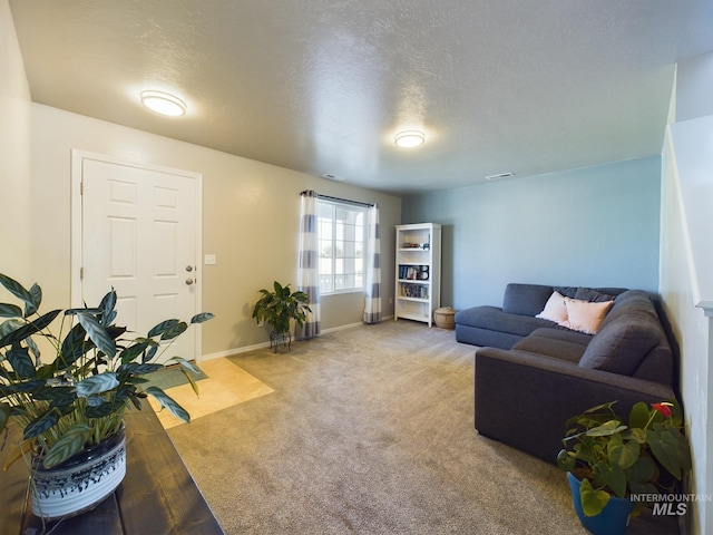 5122 Allentown St, Caldwell, ID 83605 - living room featuring carpet flooring, a textured ceiling, and baseboards