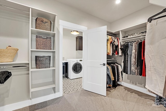 spacious closet featuring carpet and washer / clothes dryer
