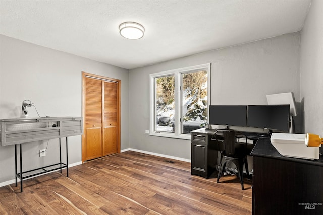 office featuring hardwood / wood-style flooring