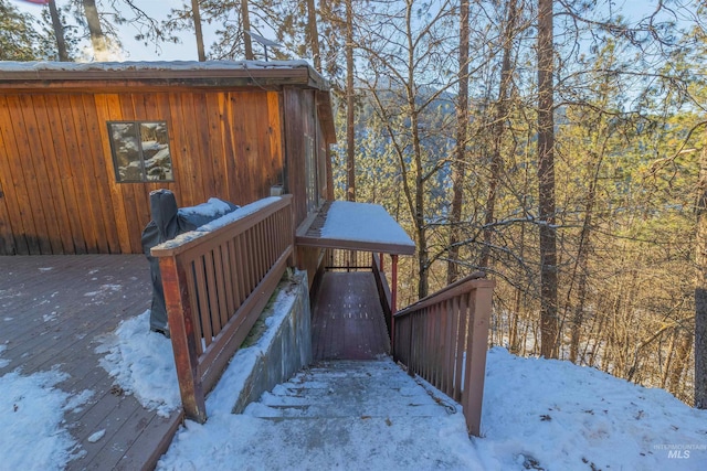 view of snow covered deck