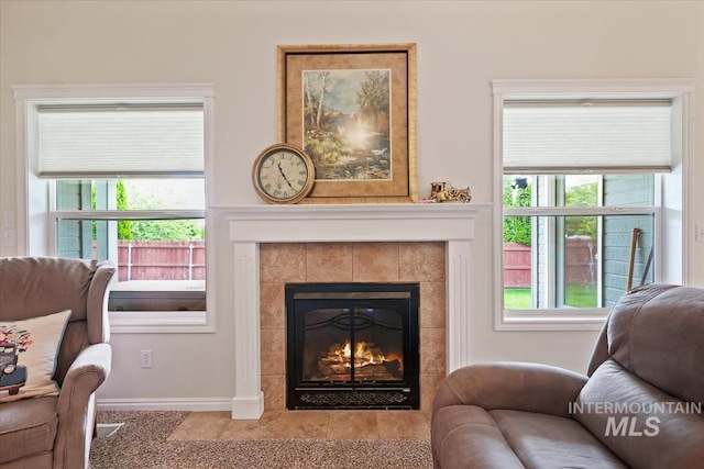 562 Castle Rock Ave, Middleton, ID 83644 - living room with a tiled fireplace and baseboards
