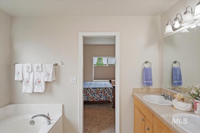 562 Castle Rock Ave, Middleton, ID 83644 - bathroom featuring double vanity, connected bathroom, and a garden tub
