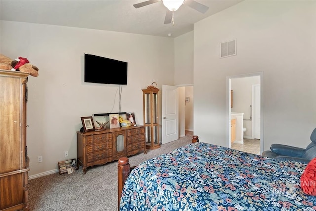 562 Castle Rock Ave, Middleton, ID 83644 - carpeted bedroom featuring high vaulted ceiling, connected bathroom, a ceiling fan, and baseboards