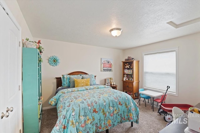 562 Castle Rock Ave, Middleton, ID 83644 - bedroom with carpet floors, a textured ceiling, and baseboards
