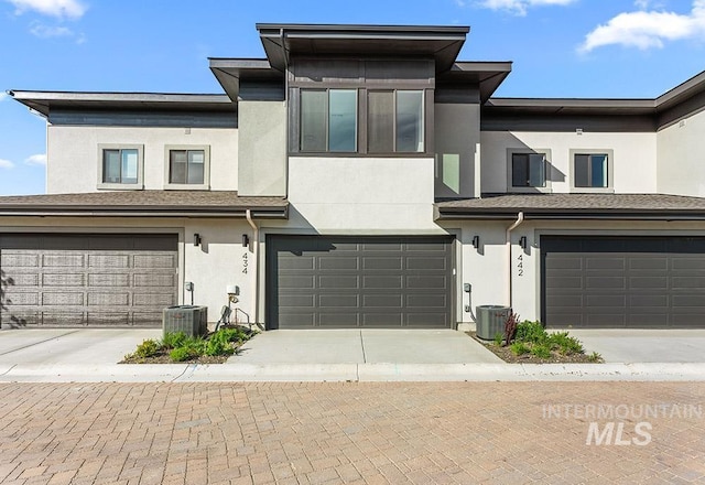 434 E Presidio Ln Lot 12/01, Eagle, ID 83616 - townhome / multi-family property featuring an attached garage, stucco siding, and driveway