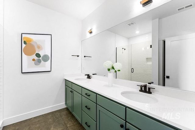 434 E Presidio Ln Lot 12/01, Eagle, ID 83616 - bathroom featuring baseboards, double vanity, a shower stall, and tile patterned floors