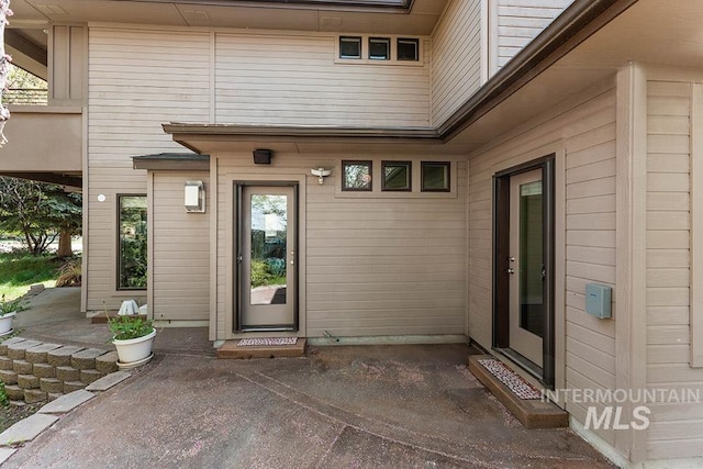 doorway to property featuring a patio