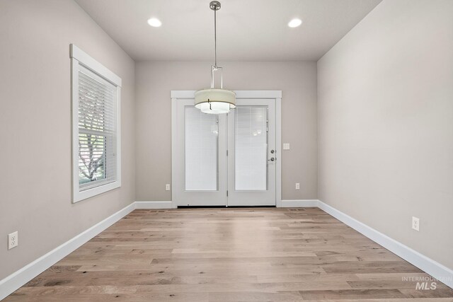 1457 Summerheights, Meridian, ID 83646 - foyer entrance with baseboards, recessed lighting, and light wood-style flooring