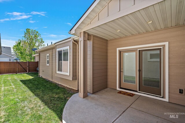 1457 Summerheights, Meridian, ID 83646 - property entrance with a patio area, fence, and a yard