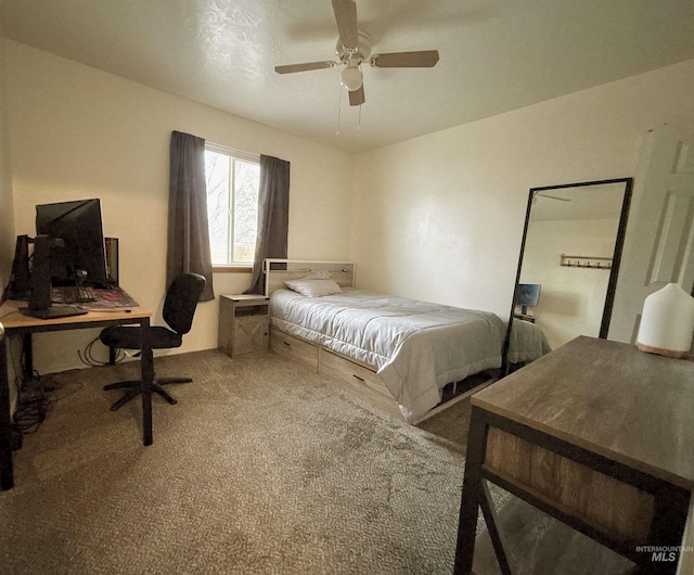 carpeted bedroom featuring ceiling fan