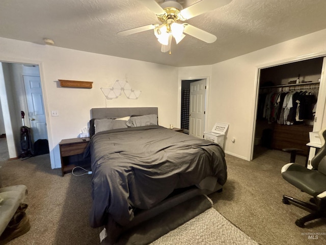 bedroom featuring carpet, a closet, and a textured ceiling