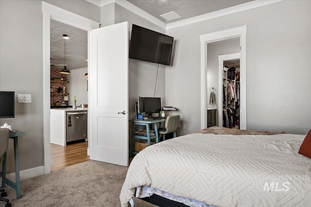 bedroom with carpet flooring and baseboards