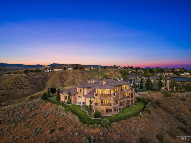 aerial view at dusk with a mountain view