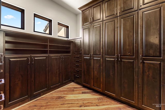 mudroom with light hardwood / wood-style flooring