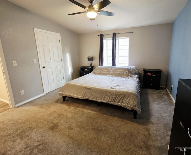 bedroom featuring ceiling fan, carpet floors, and baseboards