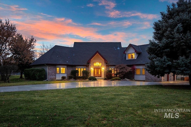 view of front of home featuring a yard