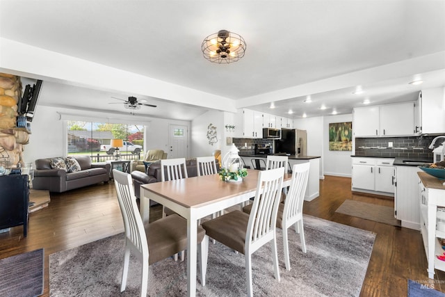 dining space with recessed lighting, ceiling fan, and dark wood finished floors
