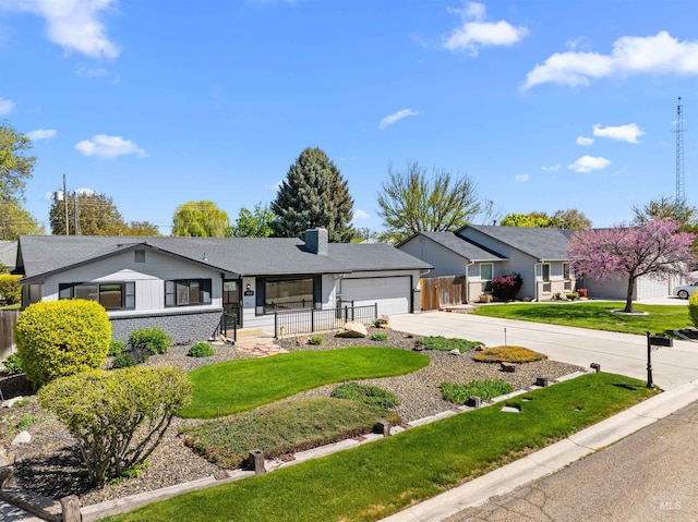 single story home with fence, a front lawn, a garage, a chimney, and driveway