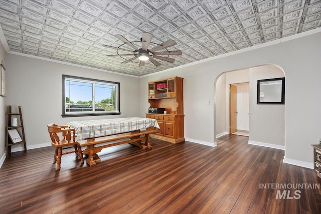 169W 200 N, Jerome, ID 83316 - dining area featuring crown molding, an ornate ceiling, arched walkways, dark wood-type flooring, and ceiling fan