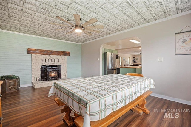 169W 200 N, Jerome, ID 83316 - bedroom with freestanding refrigerator, an ornate ceiling, crown molding, arched walkways, and wood finished floors