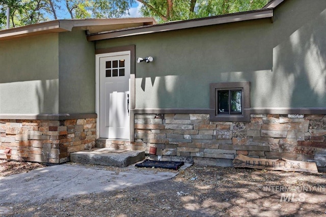 169W 200 N, Jerome, ID 83316 - doorway to property with stone siding and stucco siding