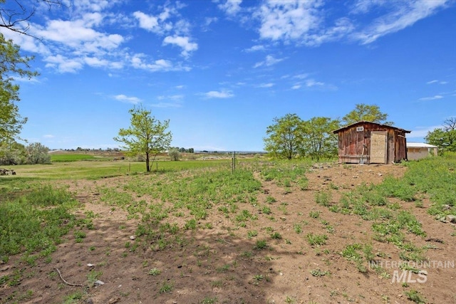 169W 200 N, Jerome, ID 83316 - view of yard with an outdoor structure, a view of rural / pastoral area, and a storage shed