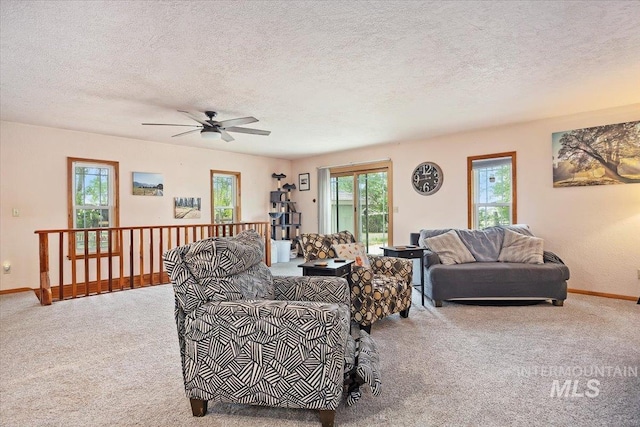 169W 200 N, Jerome, ID 83316 - carpeted living room featuring baseboards, a textured ceiling, and a ceiling fan