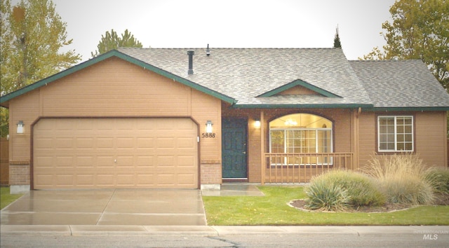 ranch-style house featuring a garage