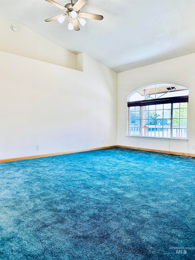 spare room featuring carpet floors and ceiling fan