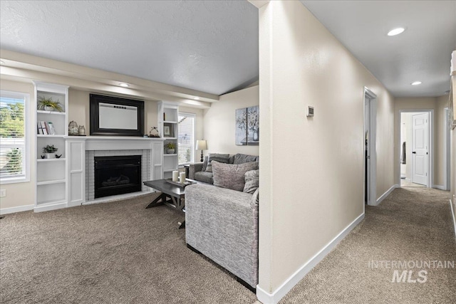1902 E Birchwood Dr, Eagle, ID 83616 - carpeted living area featuring a brick fireplace, plenty of natural light, recessed lighting, and a textured ceiling