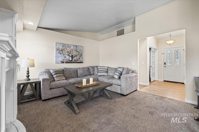 1902 E Birchwood Dr, Eagle, ID 83616 - living area featuring carpet flooring, recessed lighting, and wood finished floors