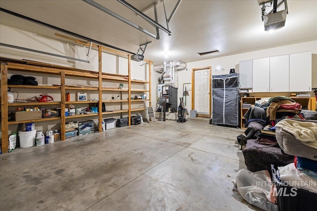 1902 E Birchwood Dr, Eagle, ID 83616 - garage featuring a garage door opener