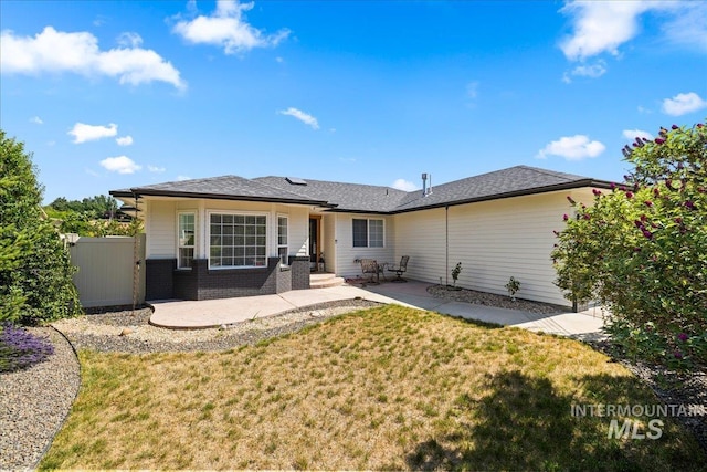 1902 E Birchwood Dr, Eagle, ID 83616 - back of property featuring a patio and brick siding