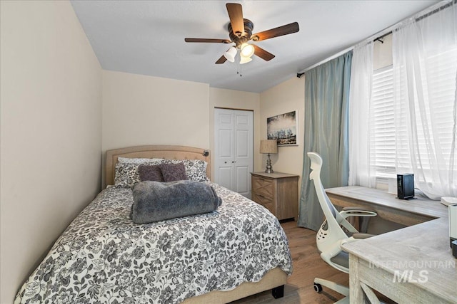 1902 E Birchwood Dr, Eagle, ID 83616 - bedroom featuring wood finished floors, a closet, and a ceiling fan
