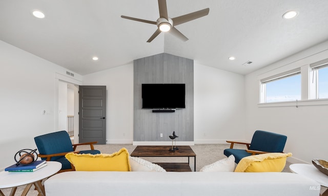 carpeted living area with recessed lighting, visible vents, and vaulted ceiling