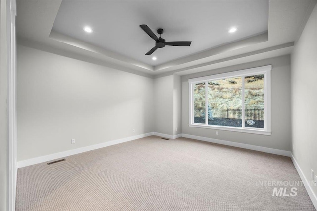 20042 N Swire Green Way Unit 459, Boise, ID 83714 - carpeted empty room featuring a raised ceiling, baseboards, ceiling fan, and recessed lighting