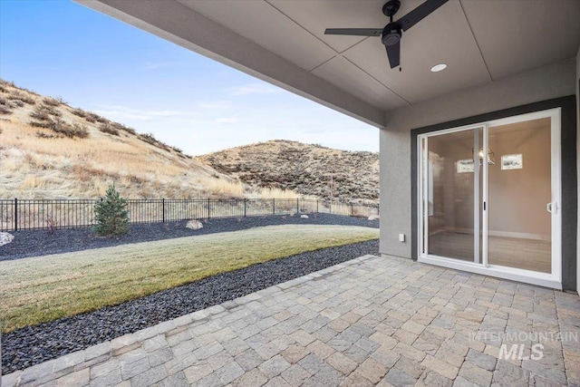 20042 N Swire Green Way Unit 459, Boise, ID 83714 - view of patio / terrace with ceiling fan and a mountain view