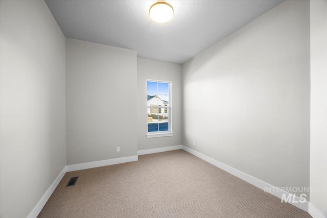 20042 N Swire Green Way Unit 459, Boise, ID 83714 - empty room featuring light carpet and baseboards