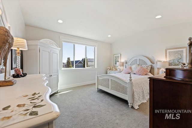 bedroom featuring recessed lighting, baseboards, and light carpet